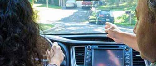 Teen and parent in car