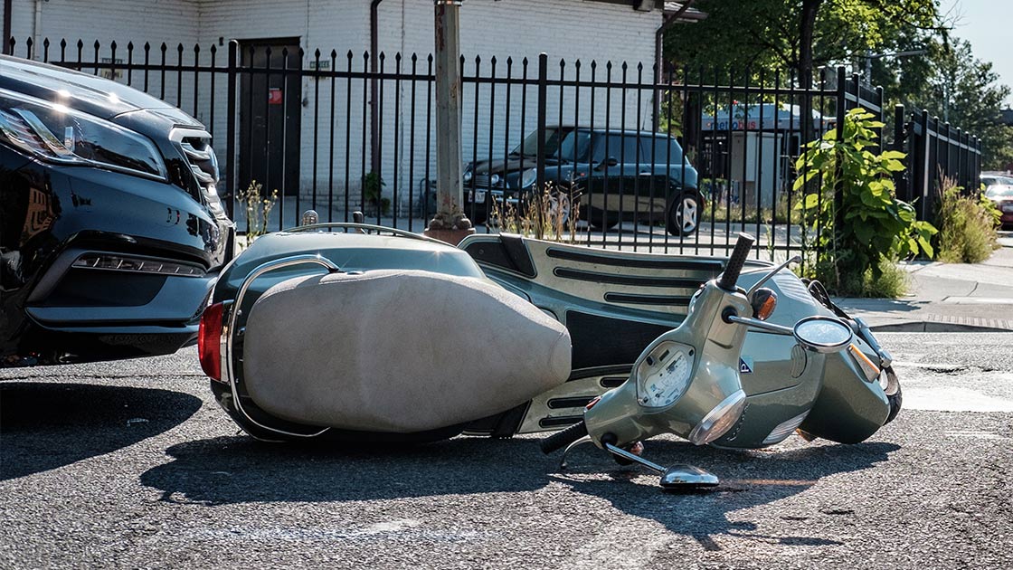 Passenger vehicle rear-ends a motorcycle